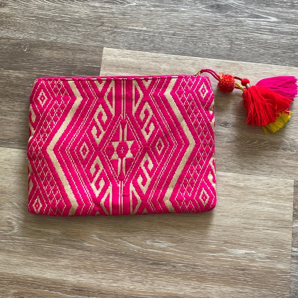 Bright pink tribal pouch